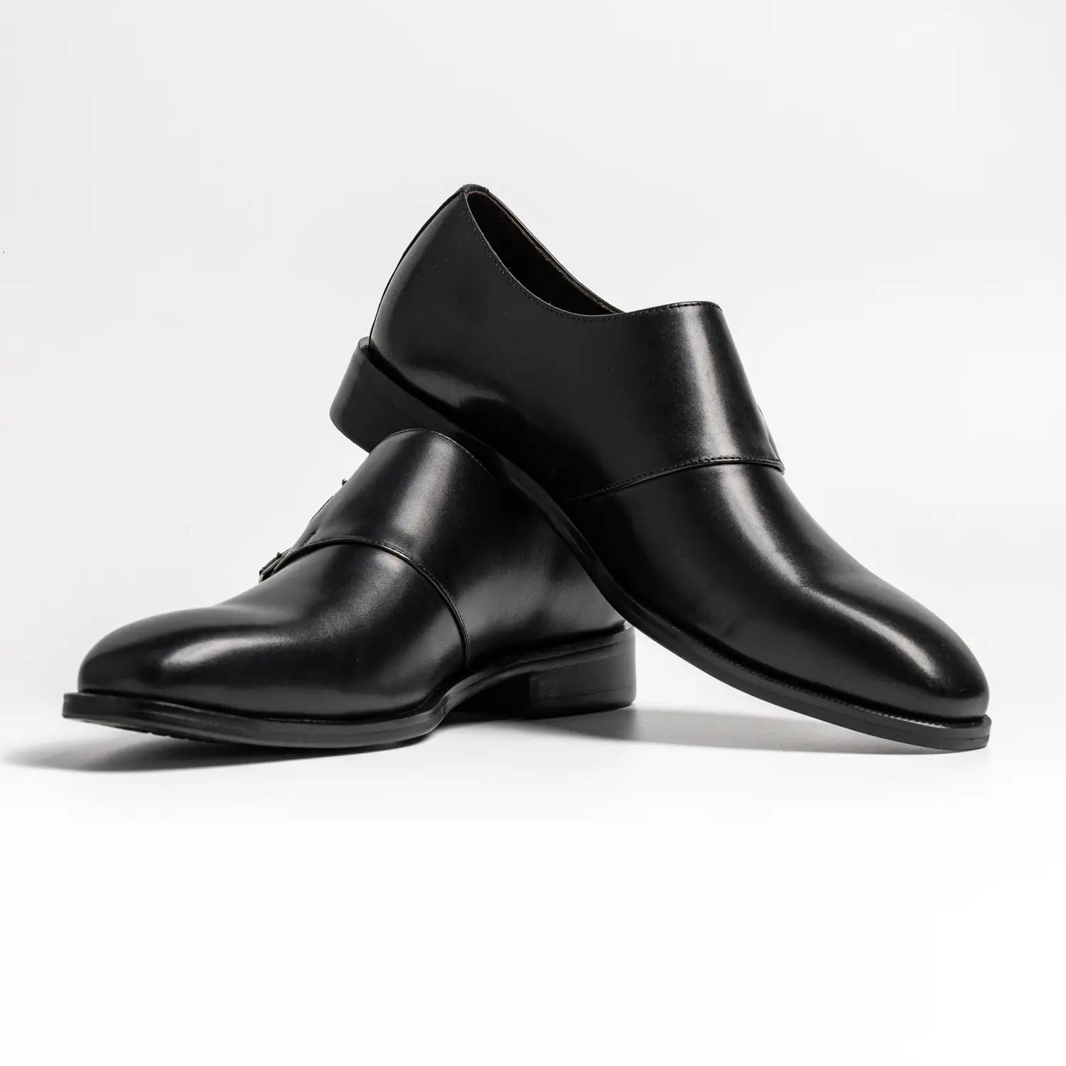 Wholecut double monkstrap in black, cross in black