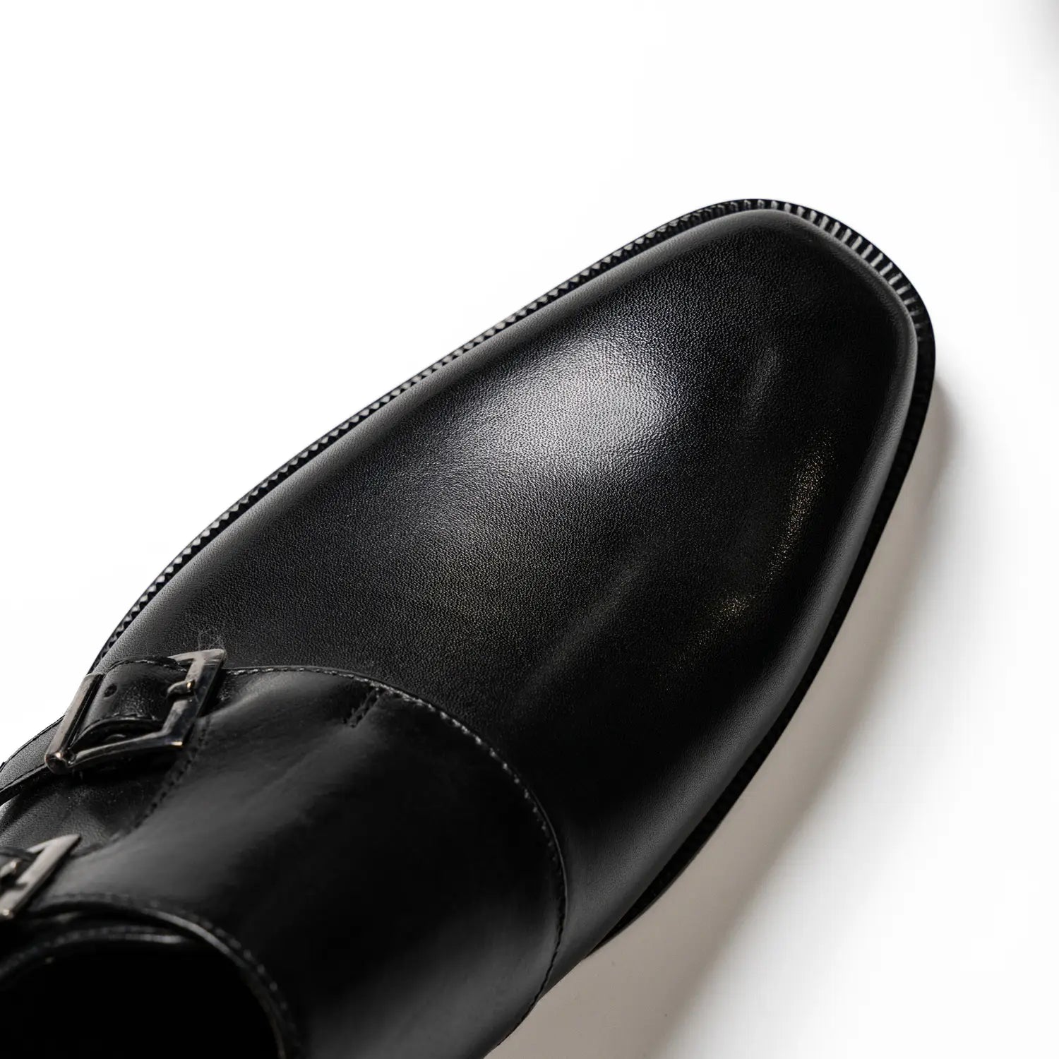 Wholecut double monkstrap in black, cross in black