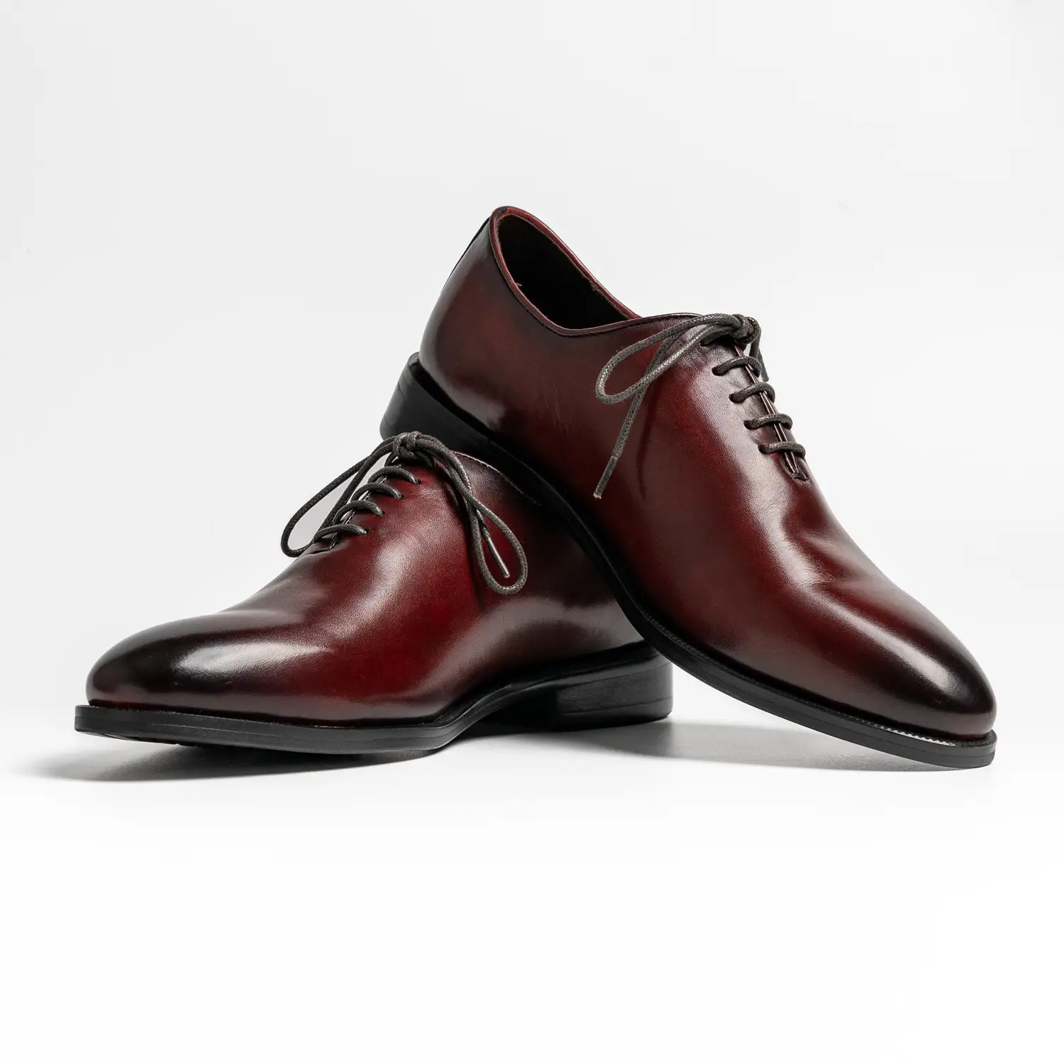 Round toe wholecut oxford in black, Collyer in Brown Red