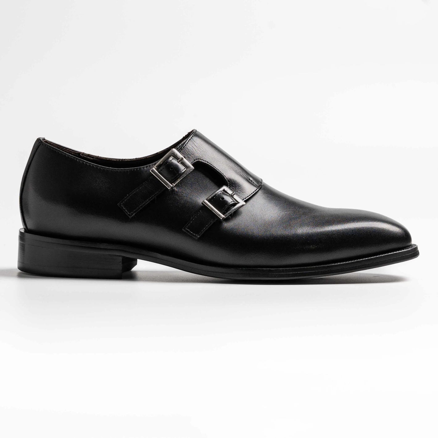 Wholecut double monkstrap in black, cross in black