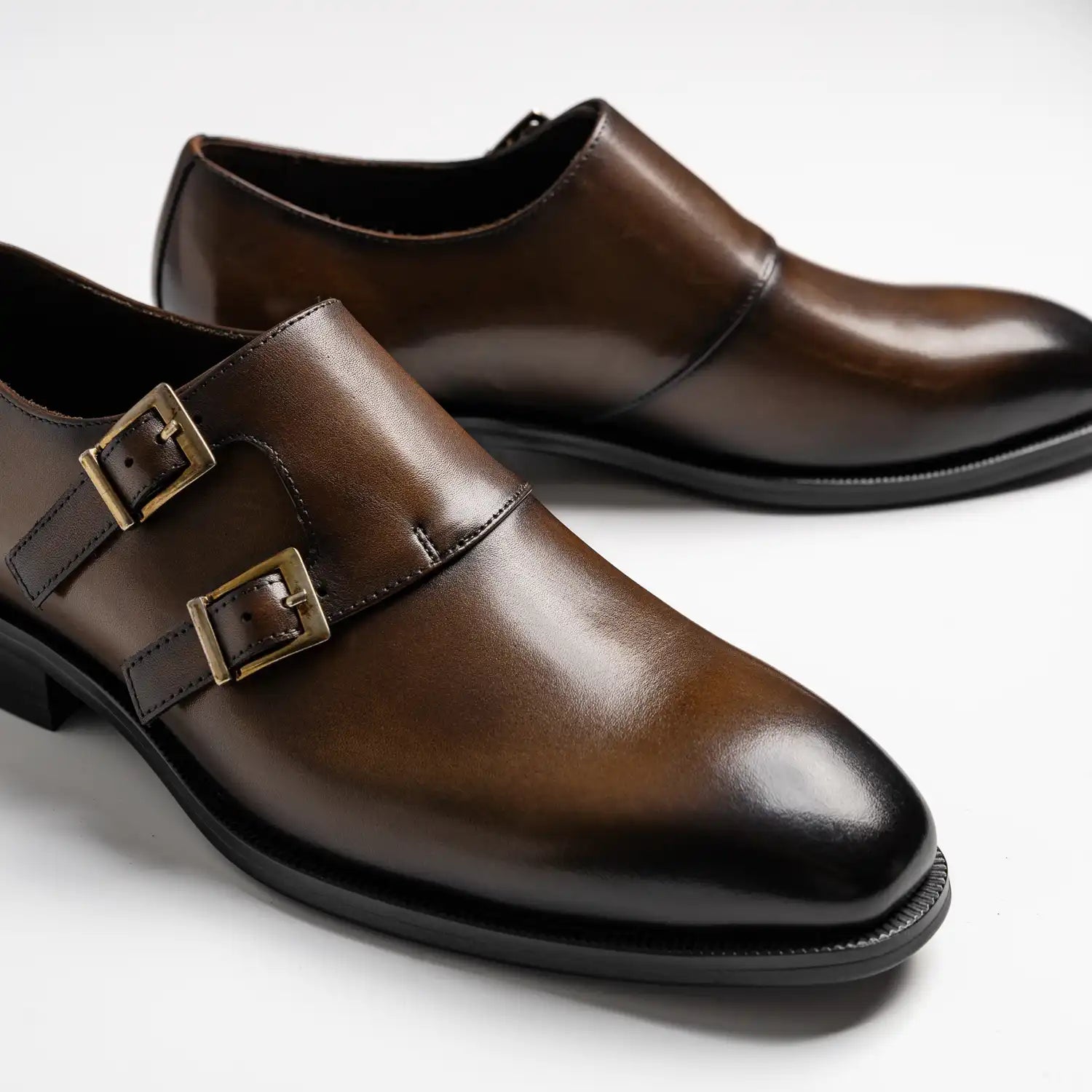 Wholecut double monkstrap in coffee, cross in coffee