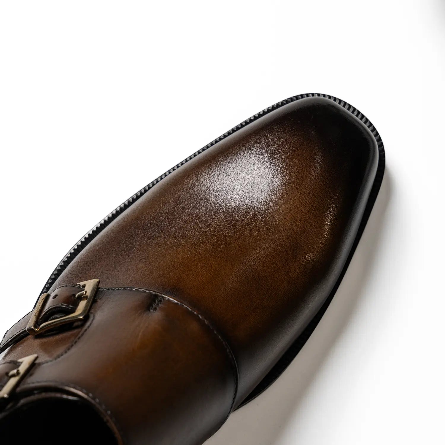 Wholecut double monkstrap in coffee, cross in coffee