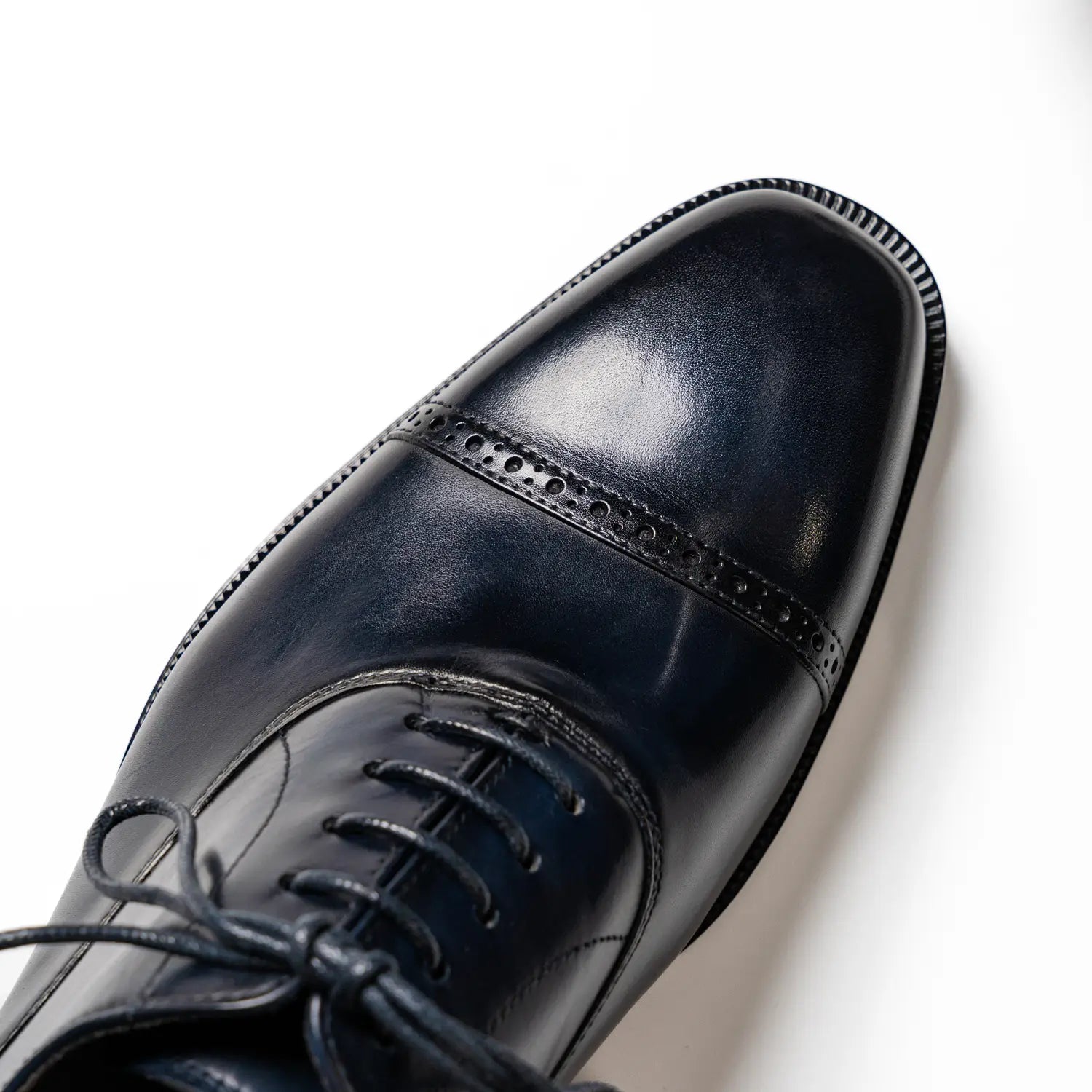 Quarter brogue oxford captoe in midnight, havelock in midnight